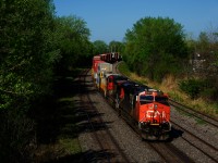 CN 120 is rounding a curve with CN 2321, IC 2708 & CN 3960 for power.