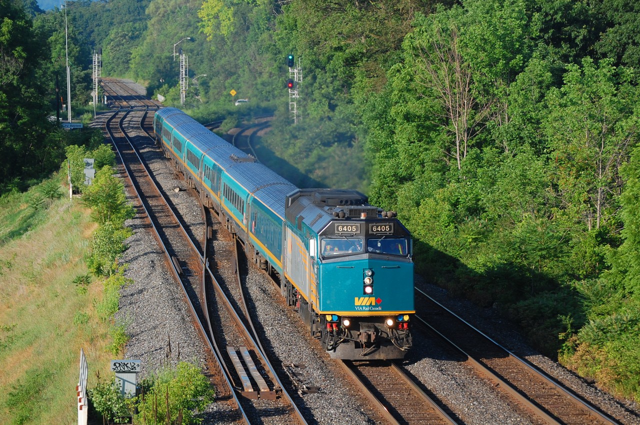 View of VIA 90 from Niagara Falls to Toronto on a sunny morning at Bayview and clear signal lined up on track 1 for a westbound.