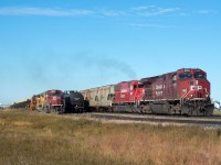 CP 602 rolls into the cautionary limits at Foot on the Indian Head Sub with 8055 and 6300 on the point.  At left is a CWR train waiting for a crew to taxi in from Moose Jaw with 5856 and 3712 for power.  I like scenes where the EMDs outnumber the GEs. 