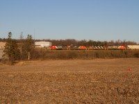 While GIO railway was performing the last revenue movements on the remainder of the Owen Sound Sub, something else caught my eye. A rare early morning 568 move (or westbound freight in general) from Kitchener straight shot to Stratford.

I was in fact on my way to check out the GIO move when I drove by the Kitchener yard, and saw this 4-pack just finishing up their shove move to grab the conductor in the Kitchener siding. This was odd as usually any train switching the west end that early, ends up moving to the east end and going to Shantz and/or Guelph/Acton. But once I saw the conductor getting on board, and the huge train of mixed cars for HCL, GEXR, Kellys and more, I knew something different was up. So I stuck around and took advantage of the chance, and knocked some shots off my list west of Kitchener in the nice morning light. Here's one of them just between Kitchener and Petersburg. 

Also not sure if this was and extra or not, but they called themselves 568 on the radio. 