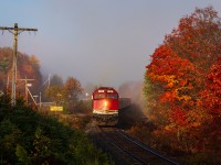 Early morning light, vibrant autumn colours and a layer of fog set the atmosphere at Northland, Ont., as Canadian National's Agawa Canyon Tour Train races towards "Canyon" on the former Algoma Central Railway.

Earlier this week, Watco announced that tickets have gone on sale for the upcoming season. The Tour Train is slated to resume operations on August 1st and will run until October 10th. Get your tickets for peak colour while you can because I'll suspect they'll go fast!