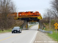 A chance encounter en-route to pick up a dog with my family near Goderich, keeping the scanner on paid off as I heard something switching near Clinton. With 13 cars in tow and after working the Junction to lift some cars, 581 is enroute toward Hensall and possibly Exeter on the Exeter Subdivision while OPP Clinton Detachment #9 passes by looking for their next victim. I'd get one more shot on the Exeter Subdivision as they blast south at.. a blistering 10 MPH pace. Talk about some of the slowest subdivision track out there... BTW is this really the first HESR 3510 shot on here? HESR 3510 is a former HLCX 1843 in new paint - repainted in November and shipped from Panama City Florida and re-directed to GEXR due to power shortage.
