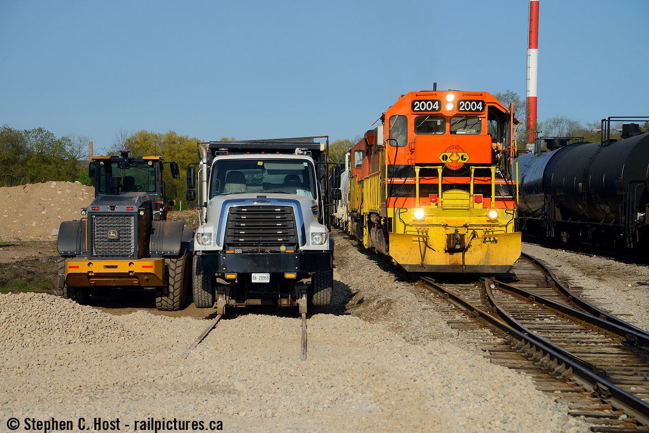 GEXR 583 is arriving in Guelph with construction equipment all around. With the death of the OBRY the Guelph Junction Railway is expanding due to increased business from the OBRY, and where the OBRY rails are being removed the GJR is adding them in return. A new track is being added at what is now called Kaufman's siding with another track planned - soon this will be a 4 track yard with the mainline right down the middle, I imagine it'll have to be called Kaufman's yard after completion. The name apparently harkens back to a company called Kaufman's Shoes (Kaufman's Rubber) but this company name only indicates a very large Kitchener factory presence, not one in Guelph based on a cursory search on the subject. More research is required.