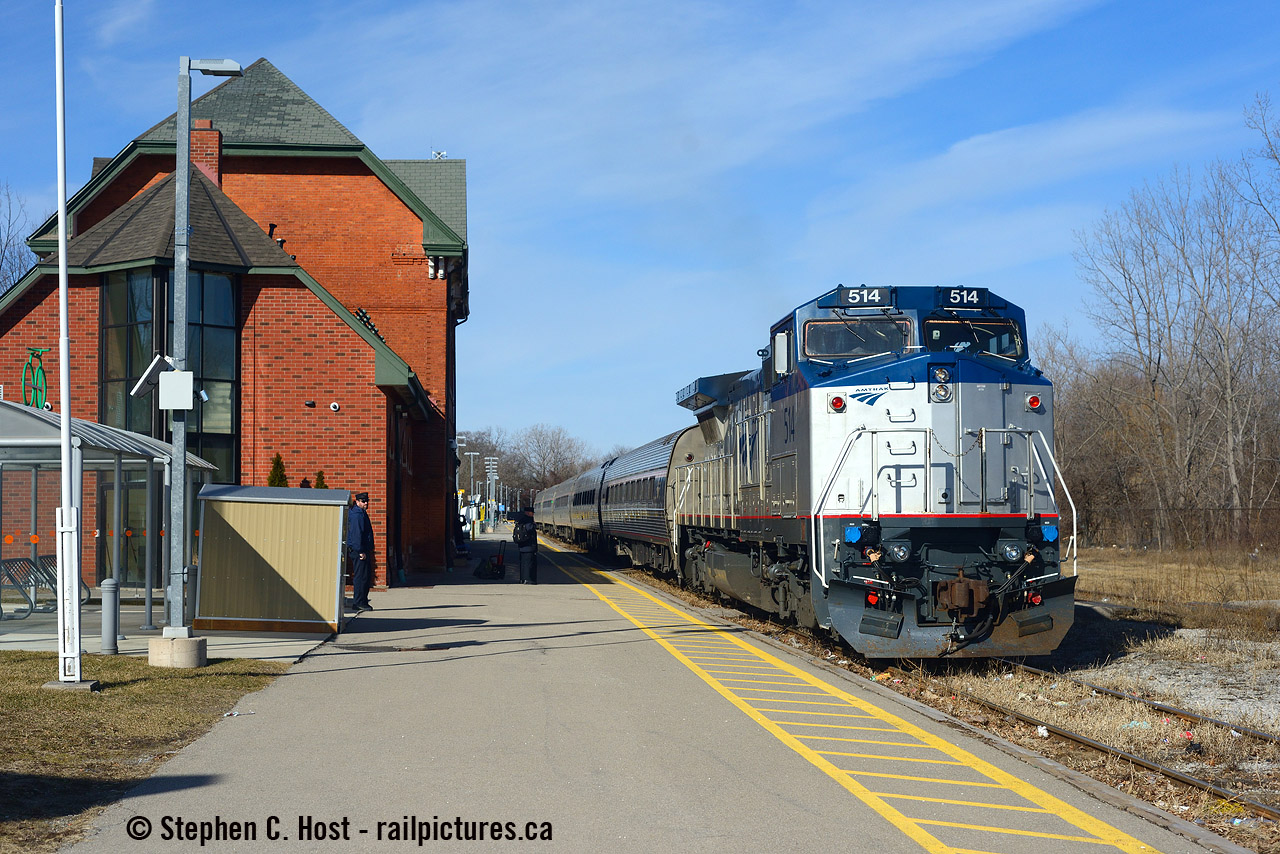 The Amtrak crew stands on the platform ready to re-crew VIA 97 and change to Amtrak 63. In charge is  an Amtrak Dash 8, a rare leader for these parts in the 21'st century. I used to see these in Guelph in the very early 2000's but any photos I have are total garbage :) But Bill Thomson Got 'em! and shared with us. Thanks Bill!