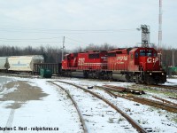 A nice pair rounding the curve at Guelph Junction. This wasn't a special train. It was every day and nobody cared then. Now, this would send the people flying looking for their next religion trackside