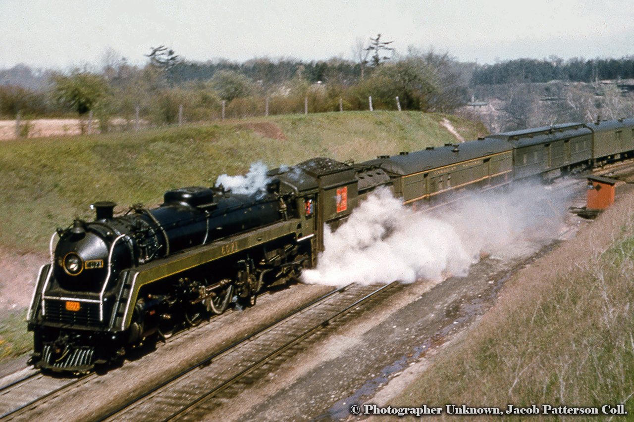 CNR 6071 takes train 75, the "Forest City", up the grade from Hamilton West towards Dundas and on to it's destination of London.Original Photographer Unknown, Jacob Patterson Collection Slide.