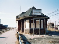 The CN West Toronto station as seen on a spring afternoon in April 1994. Vandals and time were slowly taking their toll on the aging structure and it would eventually be demolished in 1999.