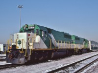 <br>
<br>
    GO Transit EMD's: Class GC-430f, geared for 83 m.p.h.
<br>
<br>
   Acquired 1982 from the Chicago, Rock Island & Pacific, EMD 1967 built GP40-M-2's await the next assignment 
<br>
<br>
   GO 720 to 726 active on the GO roster until 1993-94 then traded to EMD for the F59PH's #562-568; 
<br>
<br>
   EMD resold all seven to LLPX, numbered in the 3203 and up series.
<br>
<br>
   At GO Willowbrook January 23, 1983 Kodachrome by S.Danko
<br>
<br>
   More Willowbrook: 
  <br>
<br>
     <a href="http://www.railpictures.ca/?attachment_id= 14288 ">  round noses </a>
<br>
<br>
   sdfourty