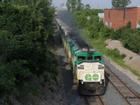 During a brief stint back in Kitchener, I managed to capture the London-Toronto GO train with the double classic F59PHs as opposed to the newer MP40PHs which dominate the system. The train is pictured accelerating out of Kitchener for Guelph on a muggy morning.  