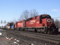 CP5683 & 5777 lead STL&H No 508 (Rougemere to Montreal) through Guelph Jct on Feb 15th 1999