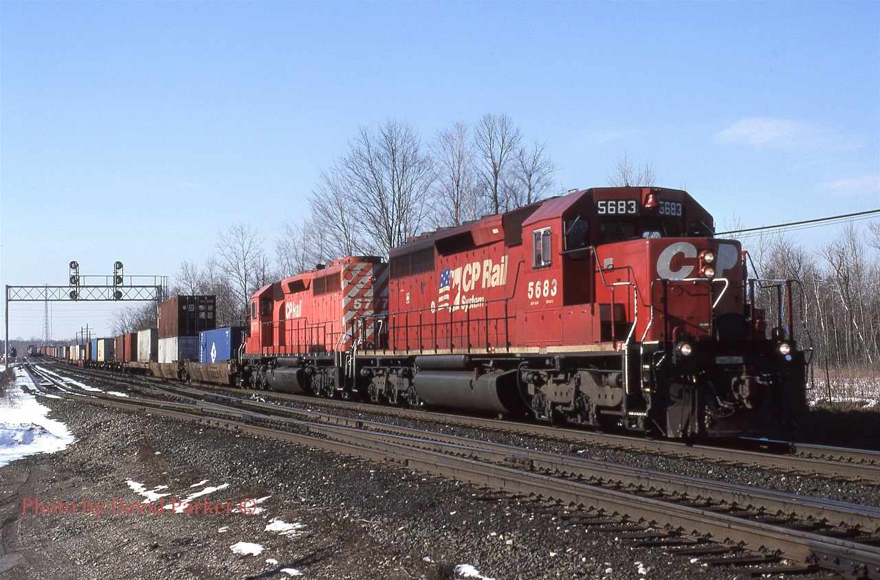 CP5683 & 5777 lead STL&H No 508 (Rougemere to Montreal) through Guelph Jct on Feb 15th 1999