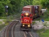 CN Z148 splits the signals at Copetown with CN 2131 leading the charge.