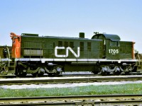 CN RSC-13 1705, class MR-10b, rests between assignments in the yard at Stratford, Ontario in May 1967. The 1705 was built by MLW in November 1955 as CN 1549 s/n 81267, renumbered to 1705. On January 27, 1976, it donated its trucks to RS-18 3857 which then became 1760.