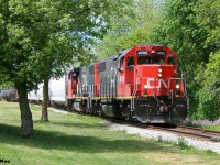 CN L540 with 4705 and 4796 slowly work their way down the Huron Park Spur in Kitchener after crossing Queen Street during a perfect spring day. L540 would set-off several cars at the interchange with Canadian Pacific before working Ampacet Canada at the end of the spur. 


