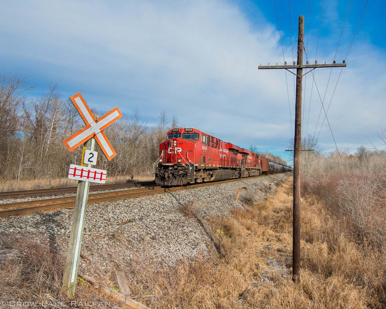 CP 651 passes by a seldom used farmers crossing on the Winchester sub as it returns back to the states last November.