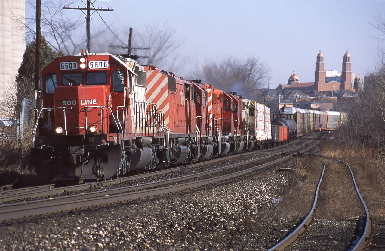 CP's Toronto to Chicago train 417 has six SD40 variations up front, all online and providing 18000 horsepower through 36 driving axles. The train is beginning to lean into the elevated curve at mile 20 of the Galt sub. 417 (formerly 511 and later 243) was always a good bet for interesting power.