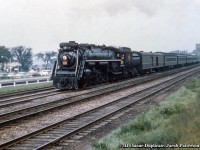 CNR U-2-g 6200 brings a morning commuter train through Sunnyside while motorists idle on the new Gardiner Expressway, this section opened in August 1958.  CNR 6200 is now on display <a href=http://www.railpictures.ca/?attachment_id=46416>at the National Museum of Science & Technology</a> in Ottawa.<br><br><i>Original Photographer Unknown, Al Chione Duplicate, Jacob Patterson Collection Slide.</i>