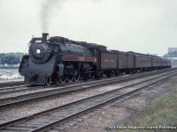 One of the two morning joint NYC/TH&B/CPR trains from New York, 322 or 324 per the 1959 timetable, departs Sunnyside for the short run into Toronto and the end of the journey.  CPR G3G Pacific 2399 leads the train.  Built by CLC in 1942, it will be scrapped in 1961.  Over 60 years later and traffic is just as backed up today as it is at left.<br><br><a href=http://www.railpictures.ca/?attachment_id=40263>Another shot of 2399 heading up this train.</a><br><br><i>Original Photographer Unknown, Al Chione Duplicate, Jacob Patterson Collection Slide.</i>