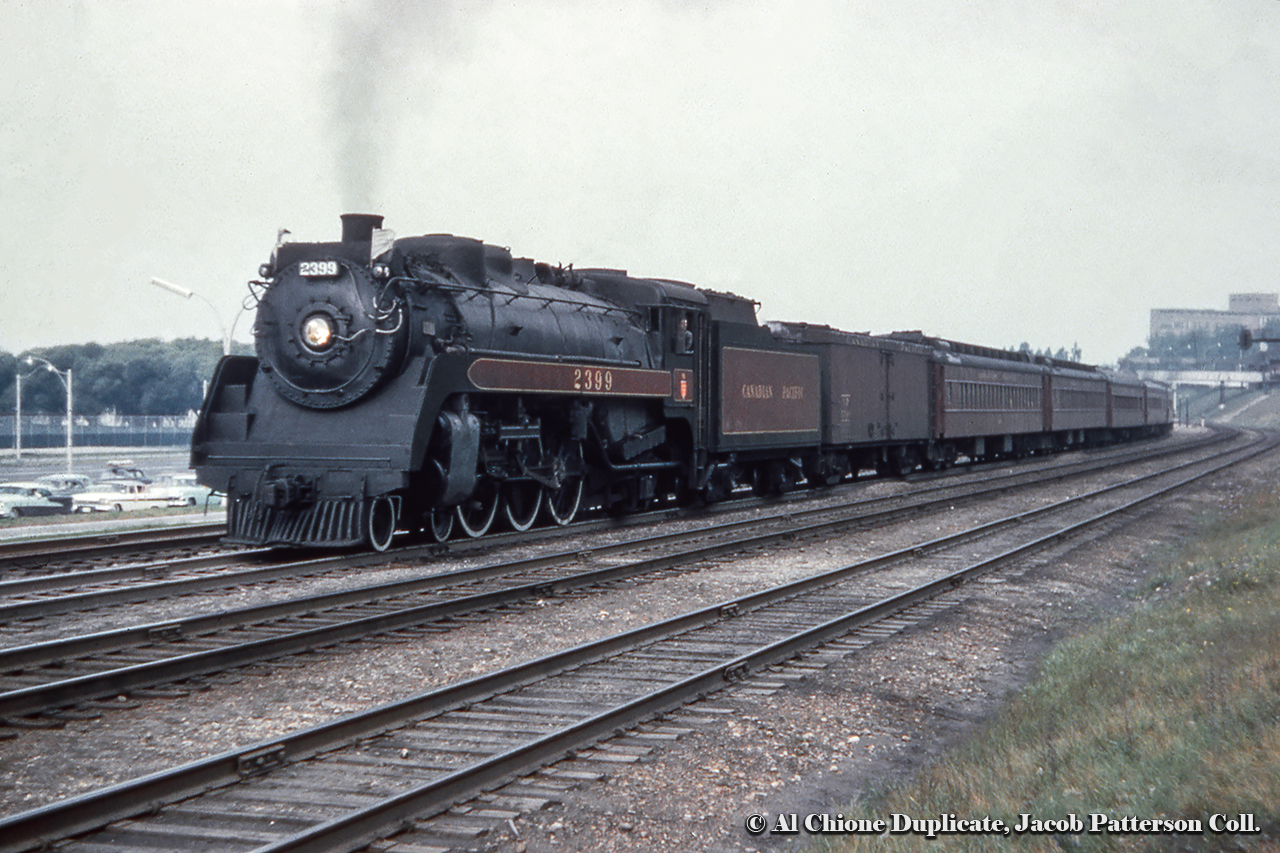 One of the two morning joint NYC/TH&B/CPR trains from New York, 322 or 324 per the 1959 timetable, departs Sunnyside for the short run into Toronto and the end of the journey.  CPR G3G Pacific 2399 leads the train.  Built by CLC in 1942, it will be scrapped in 1961.  Over 60 years later and traffic is just as backed up today as it is at left.Another shot of 2399 heading up this train.Original Photographer Unknown, Al Chione Duplicate, Jacob Patterson Collection Slide.
