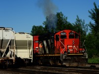 Smoke emerges from CN 4139 as CN 536's engineer starts it up at the start of his shift.