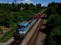 CMQ 9011 and ex-SOO CP 6607 are southbound on the Adirondack Sub, on their way to pick up a rail train at Farnham for the Lacolle Sub.