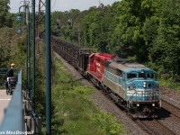 CMQ 9011 & a fresh CP 5989 take a loaded CWR train through the high mid-day sun on the North Toronto Sub. 