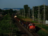 CN 321 heads west with IC 2722, CN 2225 and 98 cars as it approaches MP 14 of CN's Kingston Sub.
