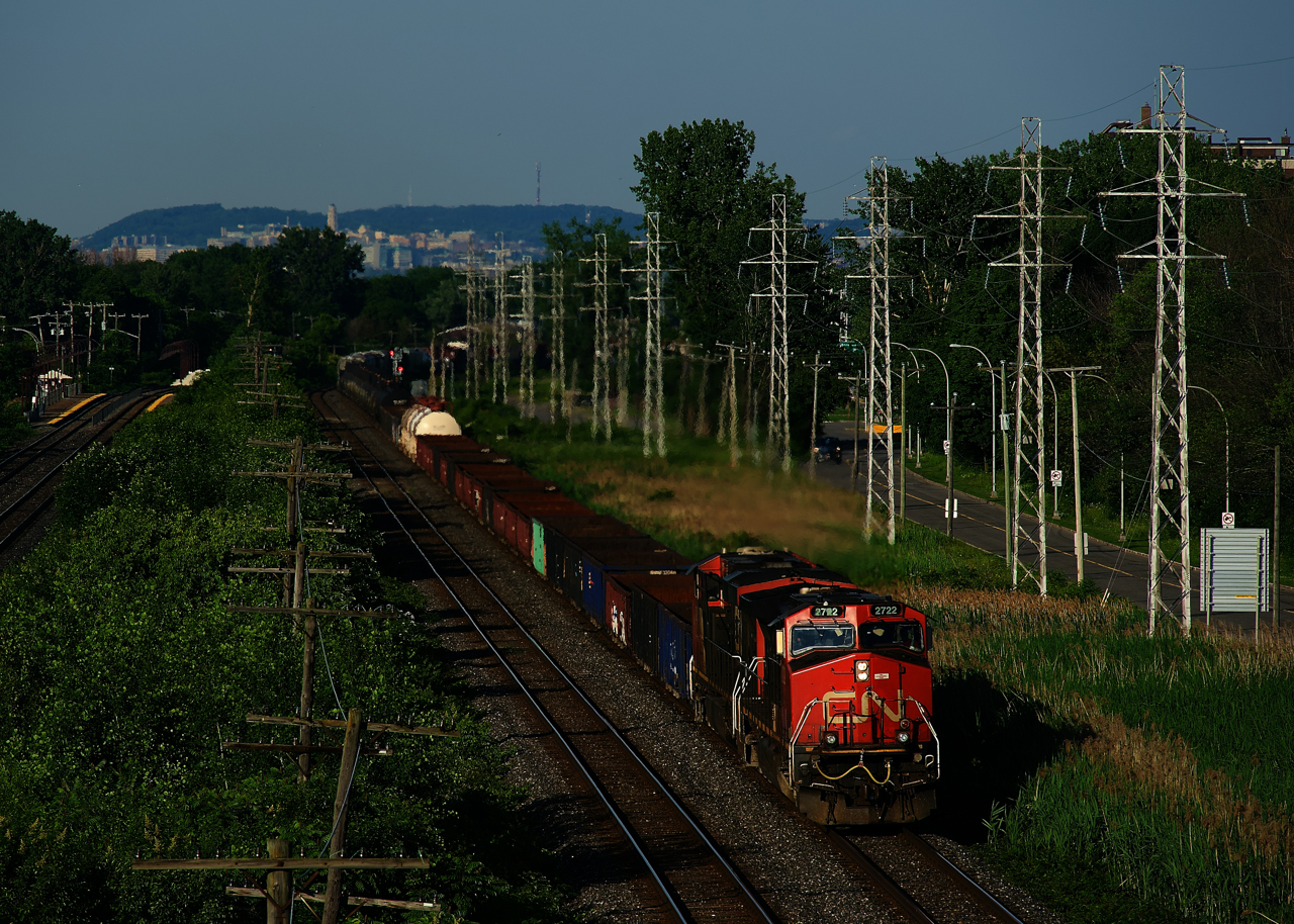 CN 321 heads west with IC 2722, CN 2225 and 98 cars as it approaches MP 14 of CN's Kingston Sub.