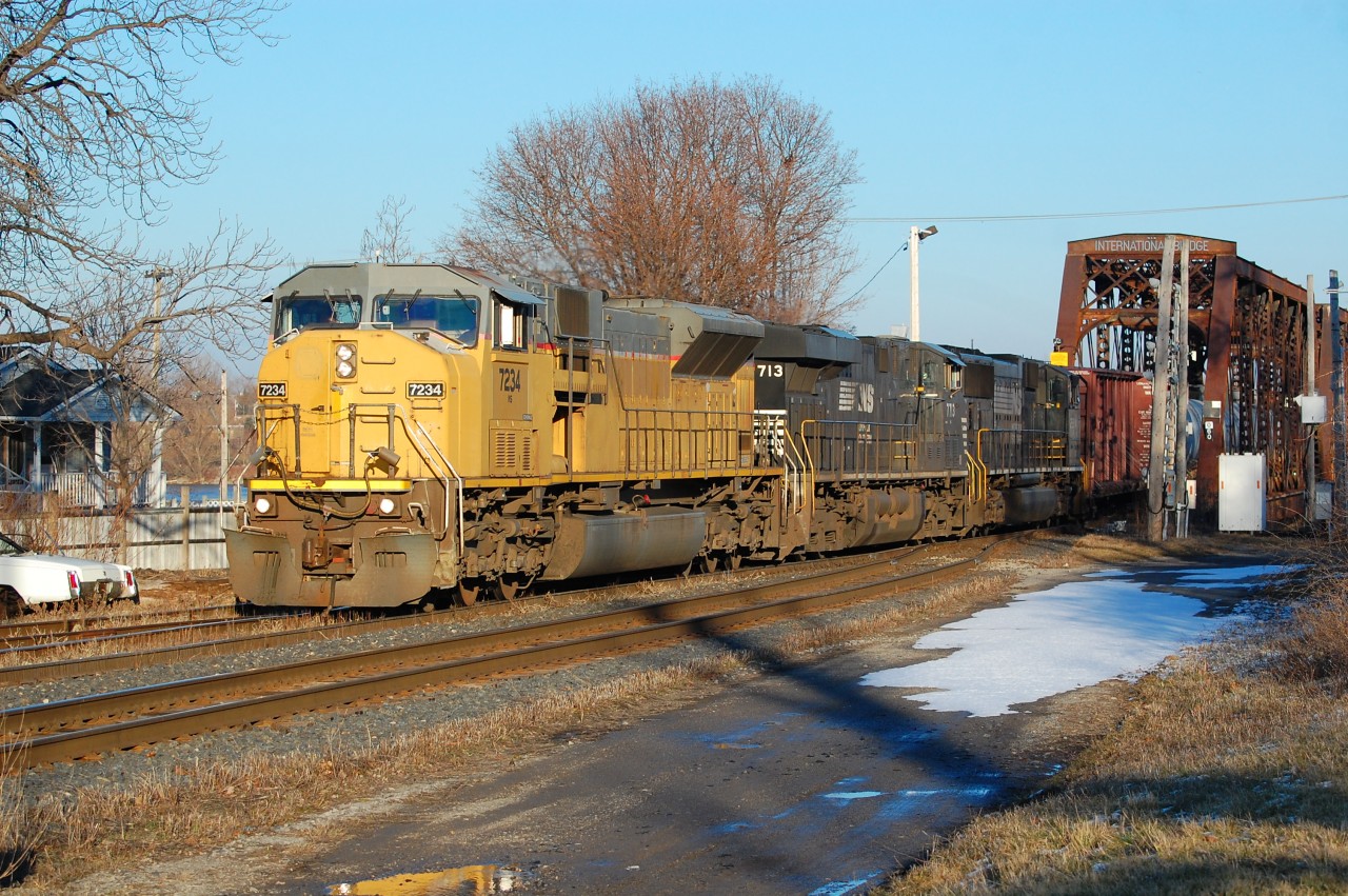 On a Sunny evening at Fort Erie, ON NS 369 came across with NS SD90Mac leading still in UP colors.