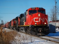 A cold sunny day on Feb 15 as 422 Departing Port Robinson West heading towards Clifton South on the CN Stamford Sub.