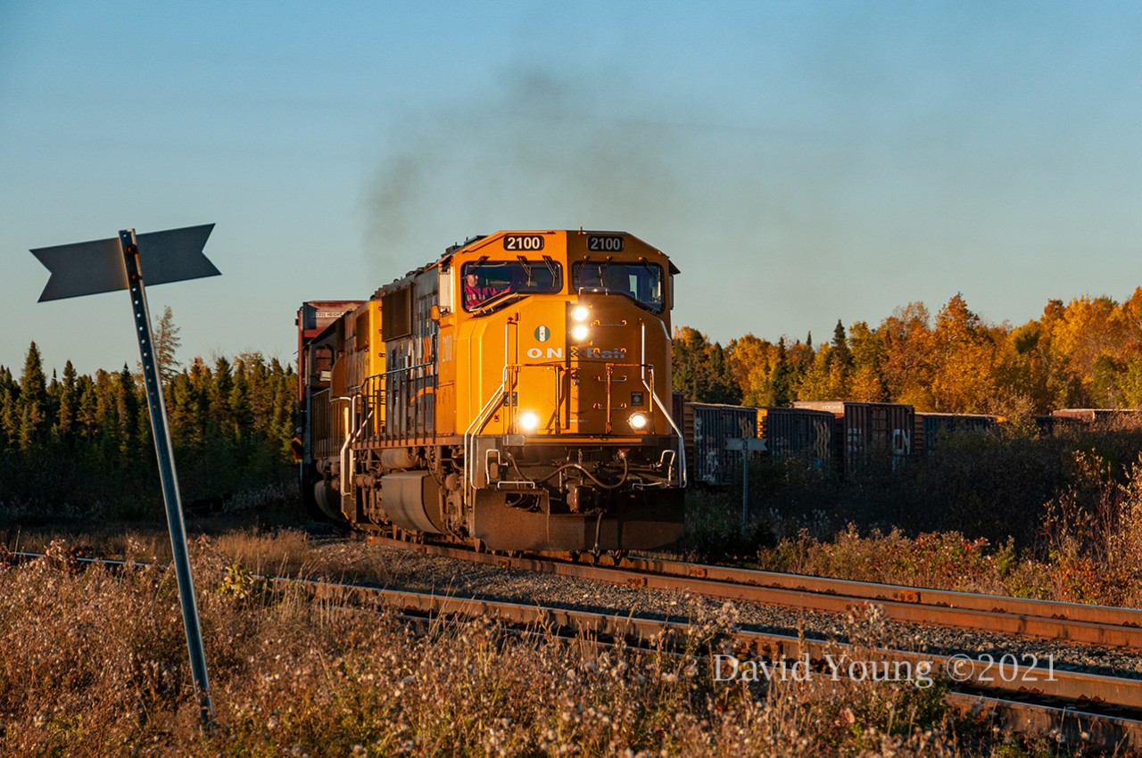 Whenever the Ontario Northland comes to mind I think Chevrons, boxcars and those uniquely stylized flanger signs. This image checks those boxes. It's nearing the end of the day on Monday, October 4, 2010 and 414's crew is lifting 27 AbitibiBowater paper loads off the Iroquois Falls Subdvision. When the crew left Englehart that morning they only had the solo SD75i 2100 and a paltry 8 cars (7 destined for Iroquois Falls). Leaving Cochrane in the evening with a much larger train and veteran SD40-2 1737 added for the influx of southbound tonnage the train will be over 70 cars ex "Welsh" (Porquis Junction). This may seem like a lot of traffic but it's just a backlog of traffic due to service reductions following the 2008 recession. ONR hadn't visited in a number of days as 213/414's crew would only make the run north to Cochrane twice a week. AbitibiBowater later restructured into todays "Resolute Forest Products" and shuttered the mill in late 2014.