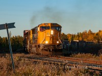 Whenever the Ontario Northland comes to mind I think Chevrons, boxcars and those uniquely stylized flanger signs. This image checks those boxes. It's nearing the end of the day on Monday, October 4, 2010 and 414's crew is lifting 27 AbitibiBowater paper loads off the Iroquois Falls Subdvision. When the crew left Englehart that morning they only had the solo SD75i 2100 and a paltry 8 cars (7 destined for Iroquois Falls). Leaving Cochrane in the evening with a much larger train and veteran SD40-2 1737 added for the influx of southbound tonnage the train will be over 70 cars ex "Welsh" (Porquis Junction). This may seem like a lot of traffic but it's just a backlog of traffic due to service reductions following the 2008 recession. ONR hadn't visited in a number of days as 213/414's crew would only make the run north to Cochrane twice a week. AbitibiBowater later restructured into todays "Resolute Forest Products" and shuttered the mill in late 2014. 

