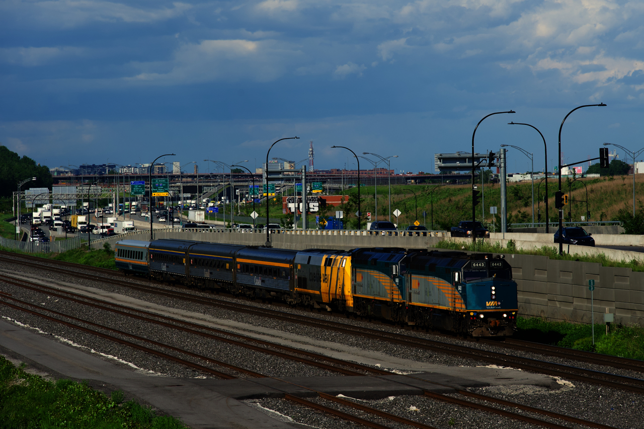 VIA 69 is rather overpowered as it passes rush hour traffic with VIA 6443, VIA 6458, VIA 911, three HEP cars and a single LRC car.