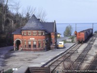 No longer in use for passengers, the CPR station at Goderich stands at the end of the line overlooking the shores of Lake Huron.  These rails will see their last train in just over a decade on December 16, 1988.  Today, all rails are gone, but the station has been relocated across the former yard closer to the lake, now serving <a href=http://www.railpictures.ca/?attachment_id=35214>as the Beach Street Station restaurant.</a><br><br><i>Dan or Don Dover Photo, Jacob Patterson Collection Slide. Dan and Don were father and son railfans (publishers of Extra 2200 South magazine) whose photos have been amalgamated as the Dover Collection.</i>