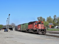 With the weed spraying season beginning soon, here's a shot of last years spray train. SD40-2, CP 6043 heads back eastward passing the old Galt train station on its way to Guelph Junction where it will work the 'Y' then head south down the Hamilton sub. Word has it this years spray train should draw some attention as well.