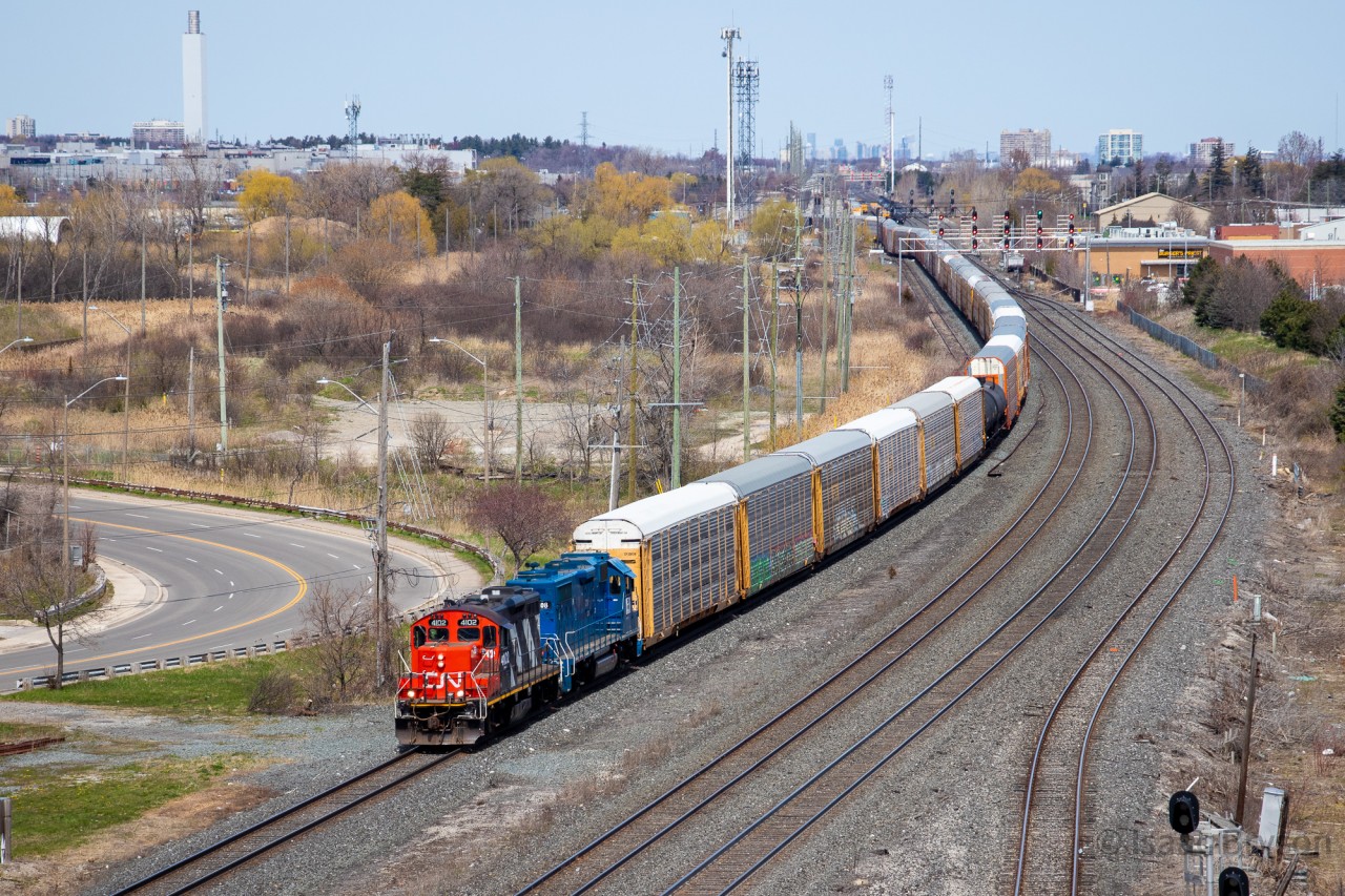 CN L554 departs Oakville yard, beginning it's journey westbound along the Oakville sub towards Aldershot with a very interesting duo. CN 4102 was built in 1958 and rebuilt in the mid 1980s and is still going strong to this day. CN 4908 was built in 1978 for the Long Island Railroad. It has been owned by LIRR, Locomotive Leasing Partners (LLPX), GATX Rail Locomotives group (GMTX), and now CN. CN 4908 is dubbed the "Pride of Mac yard" due to an interesting patch job done in the Mac yard shops.