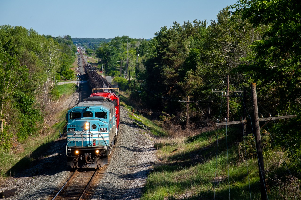 CMQ 9011 and fresh repaint CP 5989 team up to haul a half loaded CWR train down the Mactier sub Friday morning.
CMQ 9011 is one of 3 SD40-2F "barns" still actively operating under the CMQ tag, and 1 of 2 in the Baby Blues. CMQ 9020 & 9017 are the other 2 units left. The others are split between storage (CMQ 9004), New CP paint (CP 9010 & 9022), Awaiting new paint (CP 9014, 9021, 9023). And of course, the Hydrobarn out in Alberta (CP 1001 nee CMQ 9024).

CP 5989 is also an interesting unit because CP seemingly pulled it out of storage and sent it right to Mayfield for refurbishment & repaint. It's nice to see another SD40-2 come out of storage this year. 

CP 2CWR-08 was bound for the CMQ and is there now, with CMQ 9011 replaced in Montreal by a GP20C-ECO.