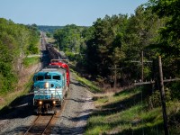 CMQ 9011 and fresh repaint CP 5989 team up to haul a half loaded CWR train down the Mactier sub Friday morning.
CMQ 9011 is one of 3 SD40-2F "barns" still actively operating under the CMQ tag, and 1 of 2 in the Baby Blues. CMQ 9020 & 9017 are the other 2 units left. The others are split between storage (CMQ 9004), New CP paint (CP 9010 & 9022), Awaiting new paint (CP 9014, 9021, 9023). And of course, the Hydrobarn out in Alberta (CP 1001 nee CMQ 9024).

CP 5989 is also an interesting unit because CP seemingly pulled it out of storage and sent it right to Mayfield for refurbishment & repaint. It's nice to see another SD40-2 come out of storage this year. 

CP 2CWR-08 was bound for the CMQ and is there now, with CMQ 9011 replaced in Montreal by a GP20C-ECO. 