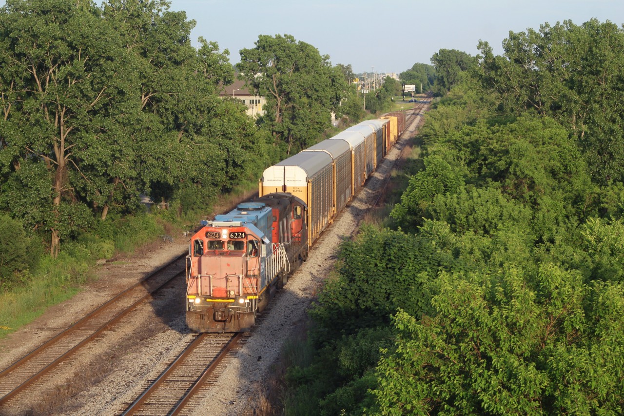 Just as the sun is going down, the CN Windsor local is seen here heading west towards CN's Van de Water Yard with a GT unit on the lead. It is quite a rare appearance to see these units down in Windsor, so I took my chances and shot him from the expressway. I'd say it was worth it.