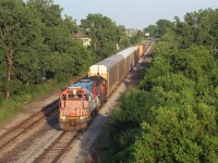 Just as the sun is going down, the CN Windsor local is seen here heading west towards CN's Van de Water Yard with a GT unit on the lead. It is quite a rare appearance to see these units down in Windsor, so I took my chances and shot him from the expressway. I'd say it was worth it.  