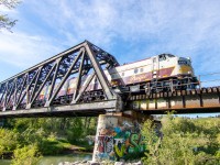 I've heard chatter on local Facebook group about the CP business train doing a trip to Banff and back today. Couldn't make it out during the day thanks to work, but after I hopped on my bike, took a quick 5 minute trackside found the best lighting I could. Got lucky it hadn't come by yet, only waited 15 minutes. Here it is passing over the twin bridges in Calgary headed back to Ogden. CP 4106 and 1401.