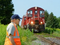  <a href=https://www.williamsfuneralhomeltd.com/obituaries?name=kenneth-jeffery-jeff-willsie target=_blank>Kenneth (Jeff) Willsie, founder and past president of the Ontario Southland railway passed yesterday.</a> A legend. One of Canada's railway pioneers.</a>  Very few folks were able to get a Shortline off the ground before 1996, and Jeff Willsie was one of them. I back this claim up pointing toward evidence of Jeff attending Ontario Pariliament <a href=https://www.ola.org/en/legislative-business/committees/regulations-and-private-bills/parliament-35/transcript/committee-transcript-1994-may-11 target=_blank>where minutes of meetings</a> show him speaking to committee advocating for creation of an act of Parliament to get his railway off the ground (ONTARIO SOUTHLAND RAILWAY INC. ACT, 1994). With the help of the pioneers like Jeff, the shortline railway industry took off, especially after 1996 legislative changes allowing anyone to run a railway.<br><br>

With legislation in hand, he grew OSR into what it is today handling over 10,000 cars per year on about 50 miles of track. Jeff was also a man of his word, a handshake was all you needed from him and the deal is sealed. He also had a huge heart, and I'll never forget an encounter back in 2015 when the first F unit was being painted. I went to the shops hoping to find someone and a train running, as long as someone was there a friendly invite inside was always an ask away,  but no one was there. Dismayed, I was about to leave when Jeff noticed me at the shop and ripped in. He told me he was driving through to the Church to drop off a cheque for for the Church's building fund (it was a Sunday morning after all) and that you have to be part of the community. After a 30 minute wait, he came back, let me in so I can take a few photos, while talking chit chat about the railway industry, after a bit of time, it was time to part ways but it was far from the last time I'd see him.<br><br>
Jeff loved his railway and when the F units were out, you'd see Jeff following the train, sometimes even Driving them, as he enjoyed seeing his railway grow, watching his trains, and helping out from time to time. With a cigarette in hand he was always telling stories about the industry, his time at CP, and some of his legendary memories. My last encounter with Jeff was pictured above, in August 2018 where I found myself following the Woodstock turn with the pups. I was heading east on Beachville road I was surprised to see someone walking the right of way, with a train coming - surely they know, right?. I stopped, got out and was surprised to see it was Jeff walking down the right of way inspecting the track for defects the old fashioned way> I told him the train's not far behind him, he turned around to see the headlight, moved aside, the crew had a quick chat with "the boss", then proceeded to Woodstock. He would follow the train on foot inspecting for defects.<br><br>
Our condolences to the folks at the Ontario Southland Railway, Jeff's family, friends, and persons in the industry and communities that Mr. Willsie has touched. He will be greatly missed by many.
 