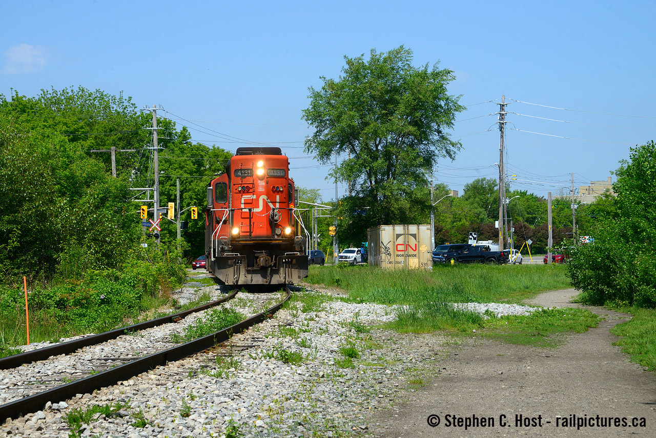 I'll bite - With the recently Bruce Lowe photo of transformers coming from ABB in Guelph (now Skyjack) I'm reminded of My similar photo but I pulled this photo off to show the Junction of the Guelph City Spur today (would have branched to the right with switch at left). Bruce was a friend of ours in Guelph and he told us stories of how CN switch crews used to park here (or on the Guelph City Spur) to get lunch at the Royal City Buffet (Chinese) restaurant, still operating today. I took my wife and kid (one at the time) here in 2009 and all I can say is everything is deep fried and a vegetable is rare. Anyway, CN has returned to the property, but just prior to Bruce's photo in 2002 there were a few MOW buildings on site that were removed around 2001. Now CN's plopped an empty? trailer on the land, I suppose to exert their private property rights? Seems they do this at various former station sites all over and I'm not sure why - Paris Station also comes to mind. Are they for a purpose?
