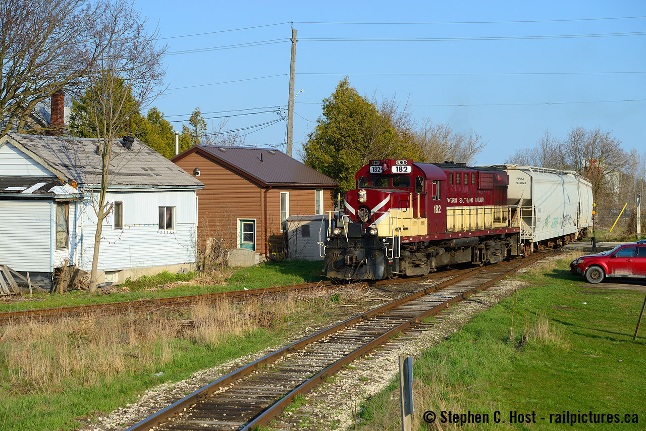 In a follow up to my GEXR rounding the wye in Guelph's St Patrick's ward I present the attached of OSR MLW RS-18 182 doing the same thing just over two years ago, seen passing the shacks near Sackville St. Of course, following Job 2 to get this shot would result in failure if they pulled into the wye on the south leg with the engine on the 'wrong' end for photos.. so getting this angle was a bit of roulette to what the Conductor wanted to do. Compounding matters, on occasion they'd just run north long hood forward (no need to wye) or just not bother to turn instead going directly into PDI Liquids.. this meant it took quite a bit of effort or luck to get this. I live close so it was easily doable for me :)