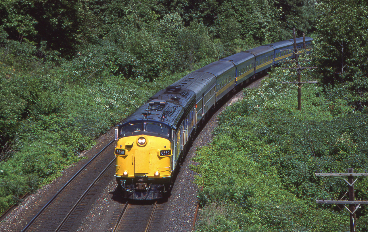 Westbound VIA 6550 is approaching Bayview Junction, Ontario on August 6, 1988.