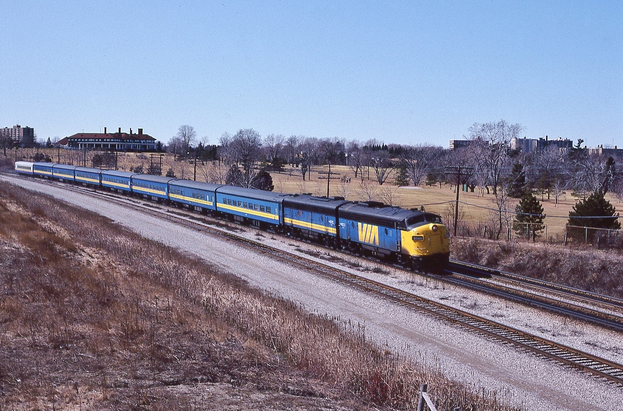 new LRC car on a test run.
 

   VIA #62 Rapido with FP9A #6533, on the approach to CN Guildwood, May 13, 1983 Kodachrome by S.Danko
 

   Noteworthy
 

   Scarborough Golf's clubhouse (circa 1913) in the upper left, note the early season golfers on the course visible above the B unit (circa 1954).
 

   at the 1913 course opening: “A friendly GTR conductor would allow golfers 'a free drop' at the pathway near the (SG&CC )clubhouse....this tradition continued for many years....” [per Scarborough Centennial Book page 10] 
 

   more:
 

       FP9A # 6523  
 

sdfourty