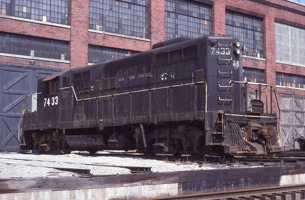 Back in the summer of 1981 I was working as a Car Control Clerk at the Conrail station in St. Thomas, Ont.  One of my duties was to make a manual yard check. If it was a nice day I usually slung the camera over my shoulder along with the yard check book and several pieces of chalk to mark up the cars.  On this particular Saturday the shop was pretty must deserted so I took it upon myself to "re-letter" 7433 back into NYC lettering along with a crude NYC oval on the hood ends. So if Larry Broadbent wondered who did it, now you know.