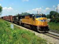 A UP 4435 leads NS 328 through St. Catharines on the CN Grimsby Sub in 2004.