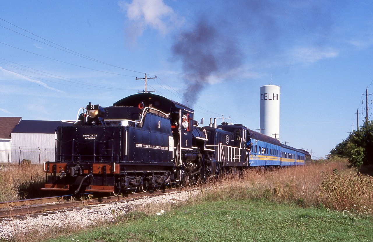 I do really miss  these days the special runs that ETR 9 did back in the early 2000’s when it was assigned to the St. Thomas Central. Between the Cayuga subdivision to the east if St. Thomas and the CASO subdivision to Shedden, the old steamer from time to time really got to stretch its legs. It’s so sad that CN wouldn’t give the museum the section of the CASO to Shedden, and even today most of the Cayuga subdivision east of Tilsonburg is gone or on the verge of abandonment. Today ETR 9 is operated many miles away up in St. Jacob’s, and is well looked after. Back in 2002 #9 ran a few specials to Delhi and back, with only one customer served in town , the writing back then was in the walls for this portion of the line, and when Trillium gave up the line years ago the last customer switched to trucks. Here ETR 9 has just run around its train at the east end of Delhi and is heading back to St. Thomas, with Delhi’s unique water tower in the distance. In 2021 a contractor finally began lifting the long out of service here and in spring of 2022 the large bridge over a creek in the west end of town was removed totally eliminating any chance of a revival of rail service here.