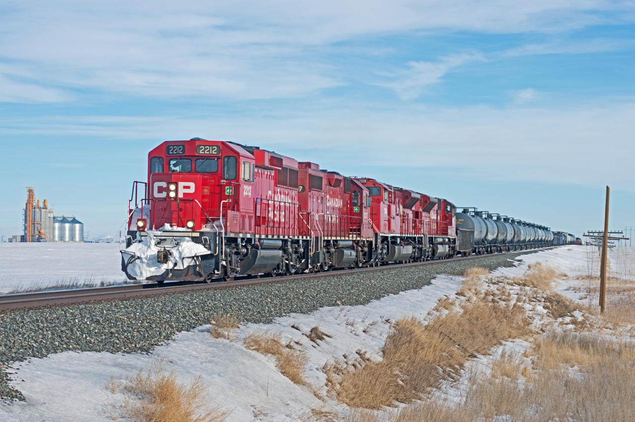 A very late CP 411 has almost reached it'd destination of Moose Jaw as it rolls into Pasqua in the Indian Head Sub.  Rescue units 2212 and 3017 were added at Broadview to make up for a dead 7058. Four EMDs on the head end is nothing to be taken for granted these days.